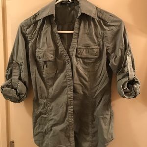 Army green button up fitted blouse.